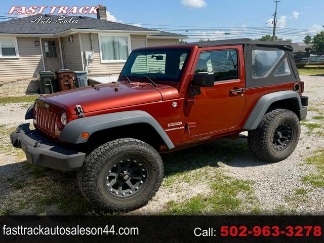 Orange 2014 Jeep Wrangler SUV / Crossover Four-Wheel Drive Automatic