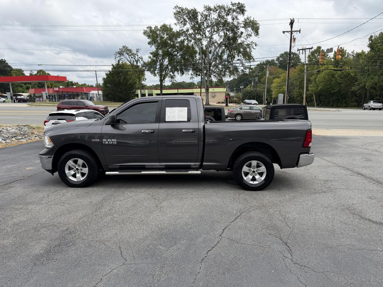 2017 RAM 1500 4WD Quad Cab 140.5" SLT