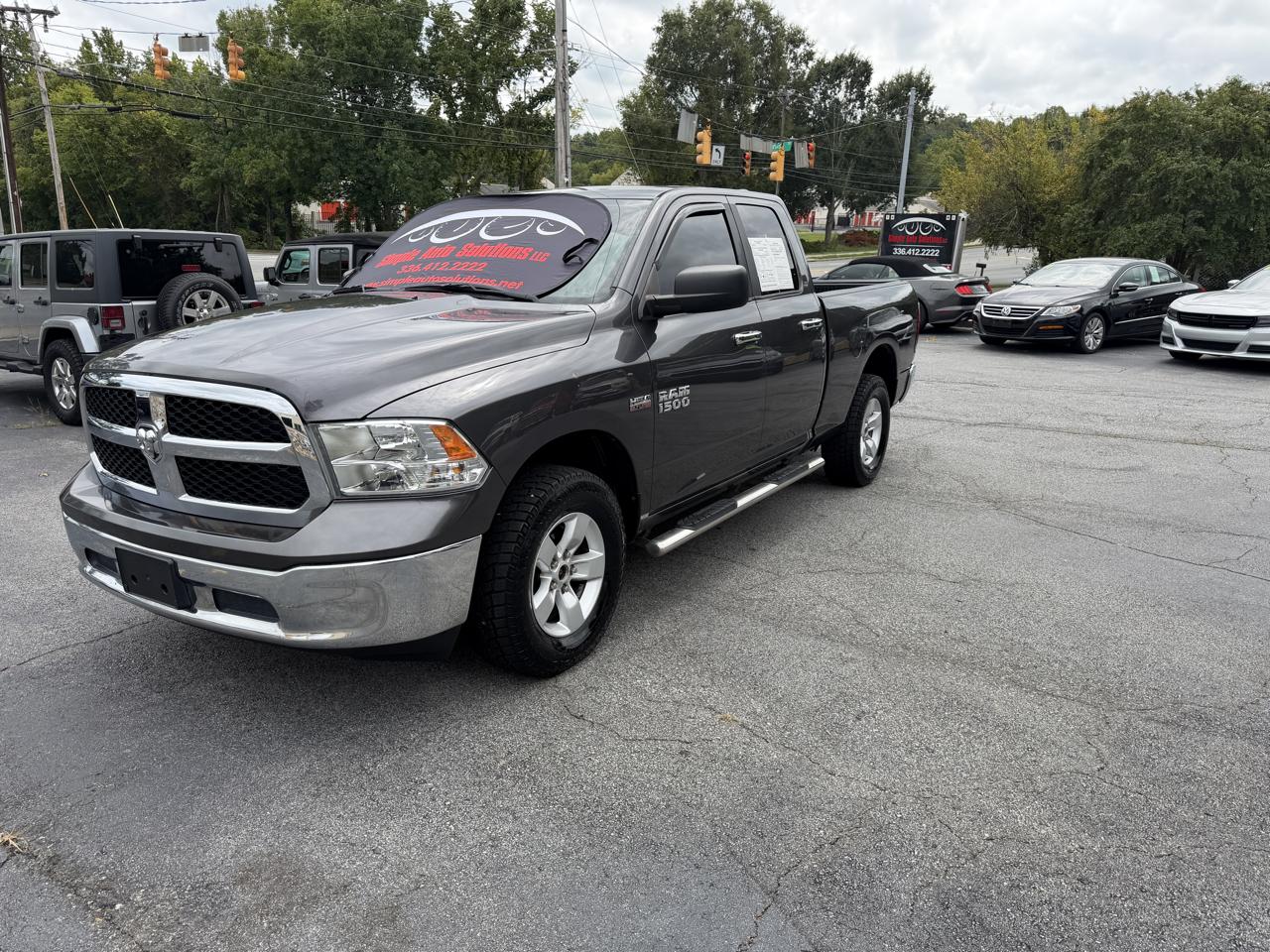 RAM 1500 4WD Quad Cab 140.5" SLT 2017