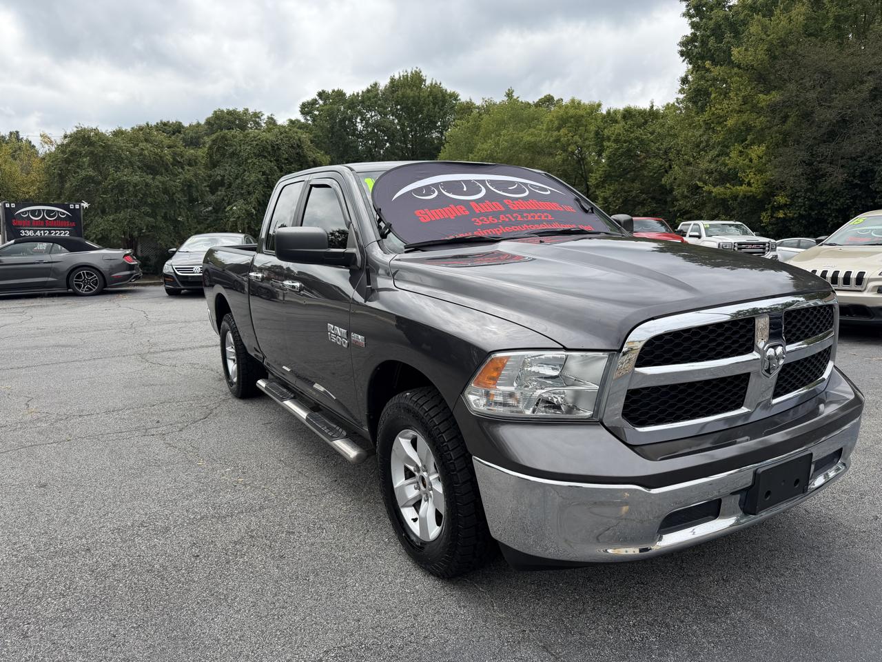 RAM 1500 4WD Quad Cab 140.5" SLT 2017