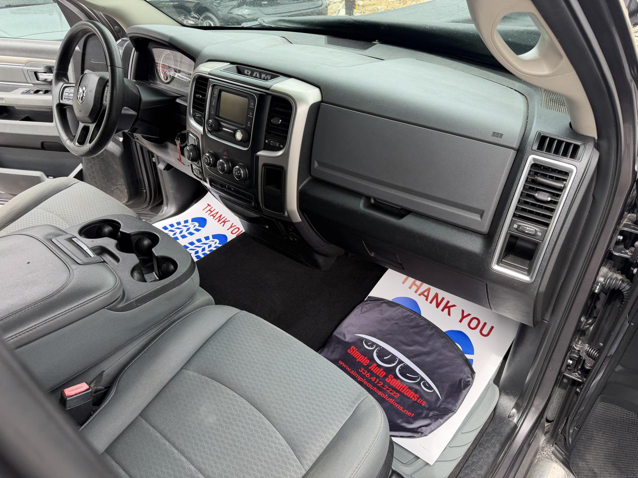RAM 1500 4WD Quad Cab 140.5" SLT 2017