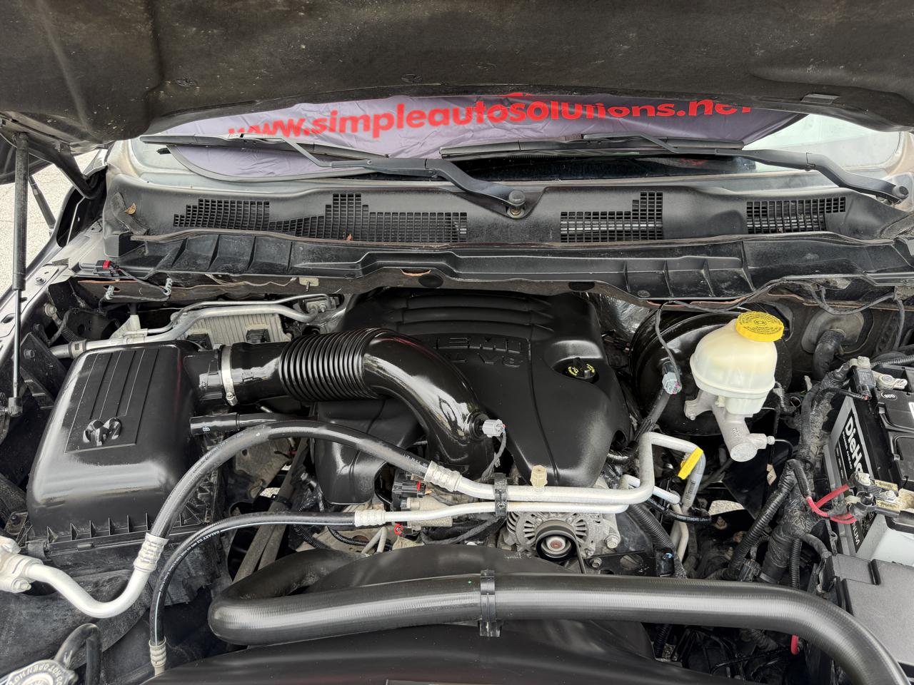 RAM 1500 4WD Quad Cab 140.5" SLT 2017