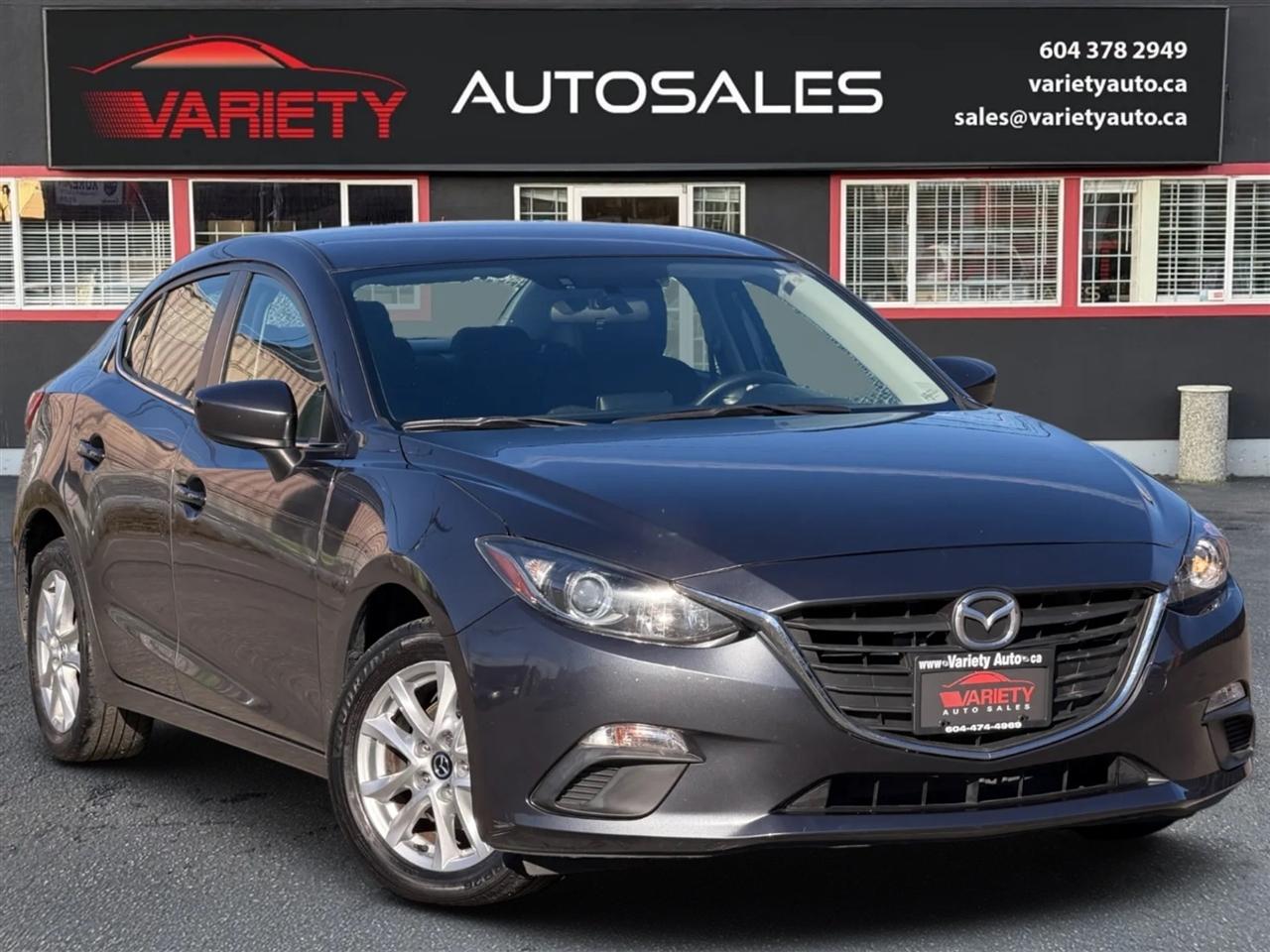 Black 2016 Mazda MAZDA3 Sedan Front-Wheel Drive Automatic