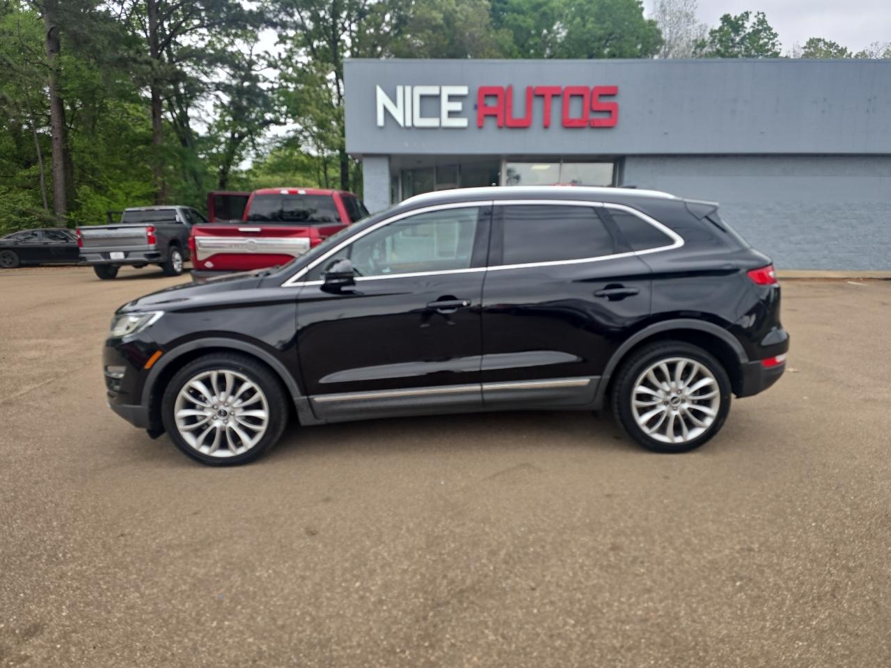 View vehicle photo 2