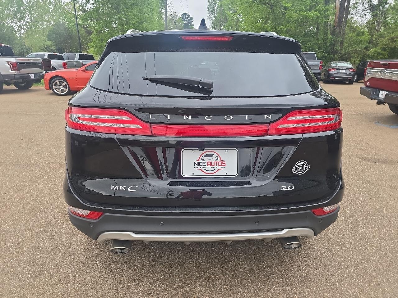 View vehicle photo 4