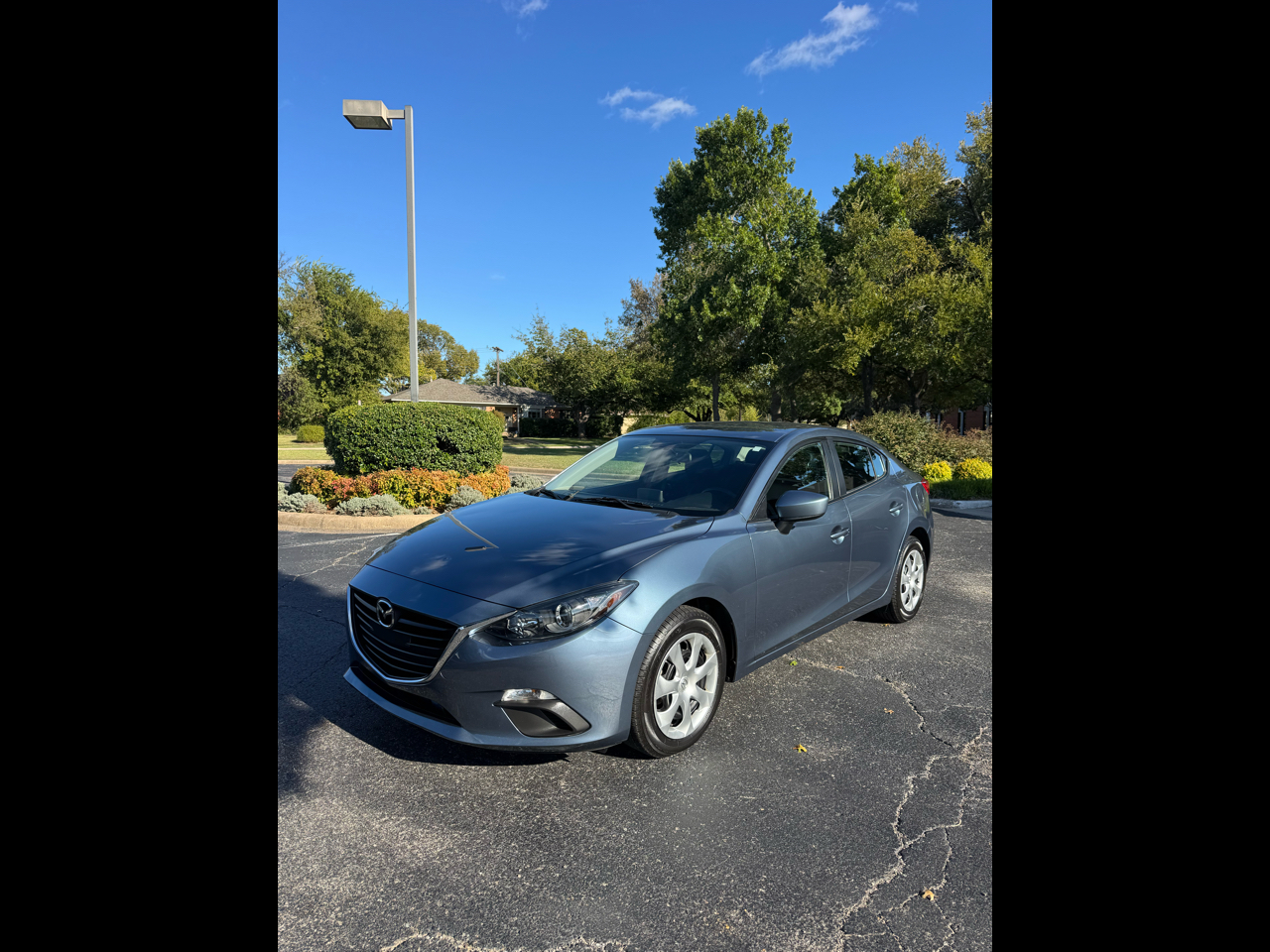 2015 Mazda MAZDA3 i Sport AT 4-Door