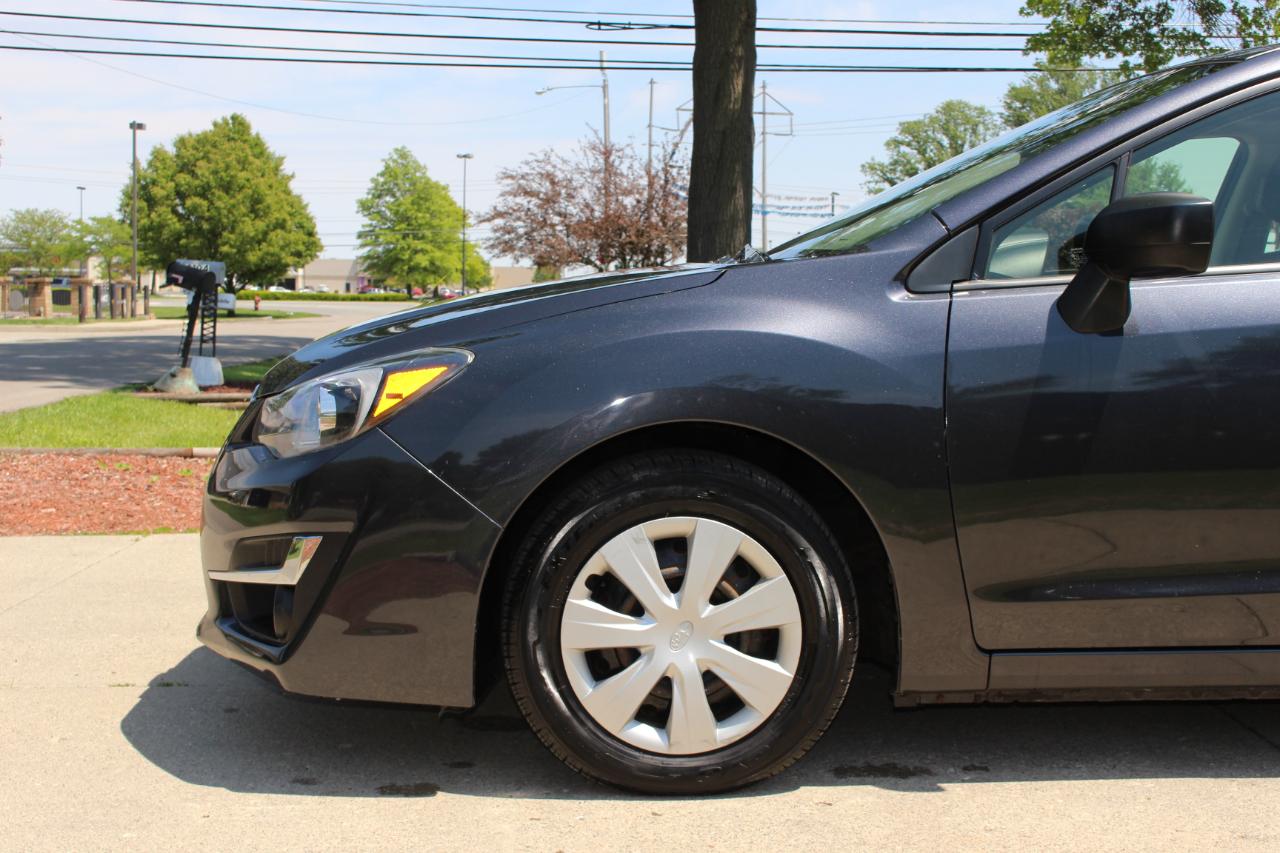 Subaru Impreza 2.0i PZEV CVT 4-Door 2015