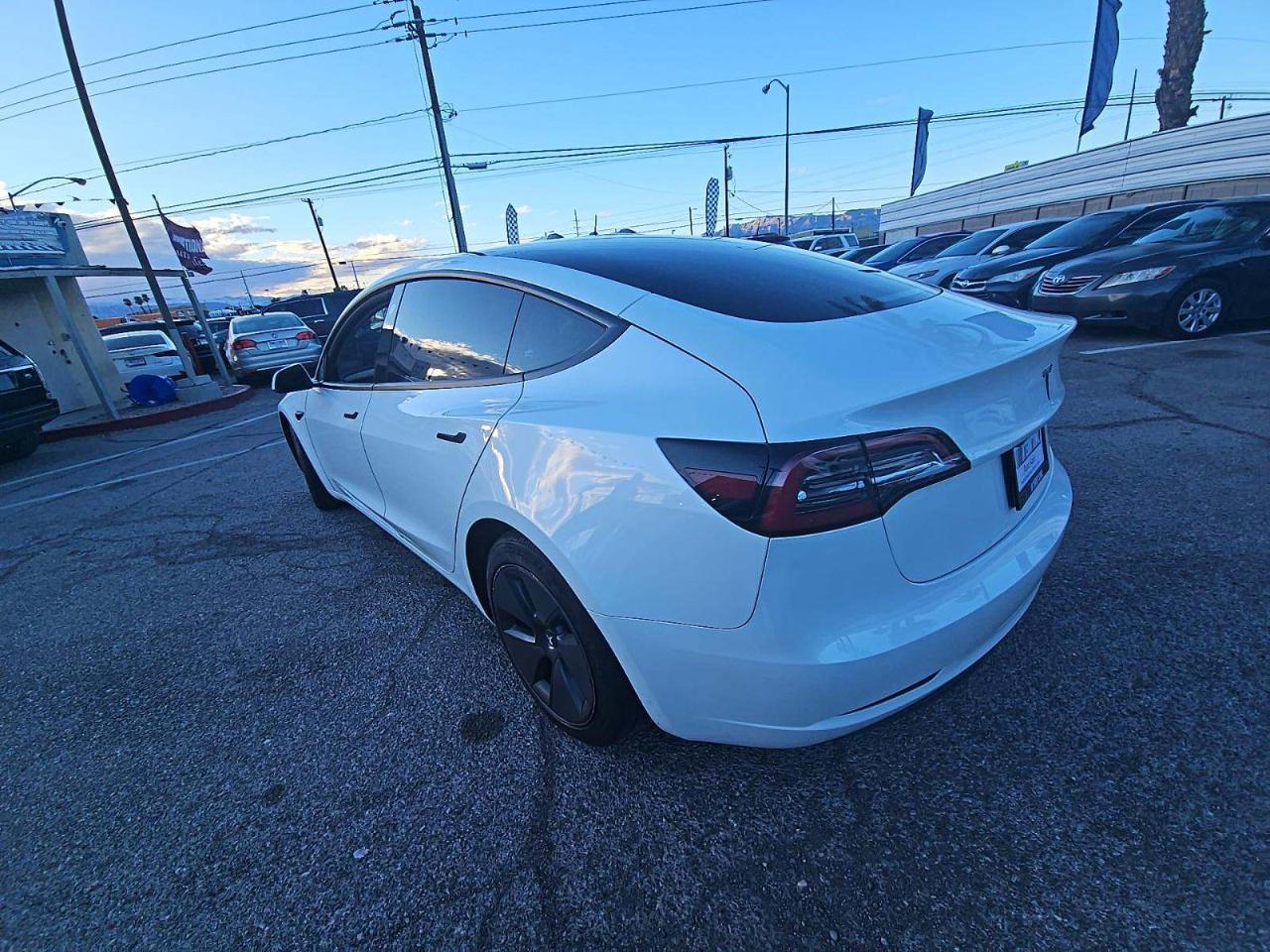 2023 Tesla Model 3 Standard Range Plus 4D Sedan RWD - White exterior view 5