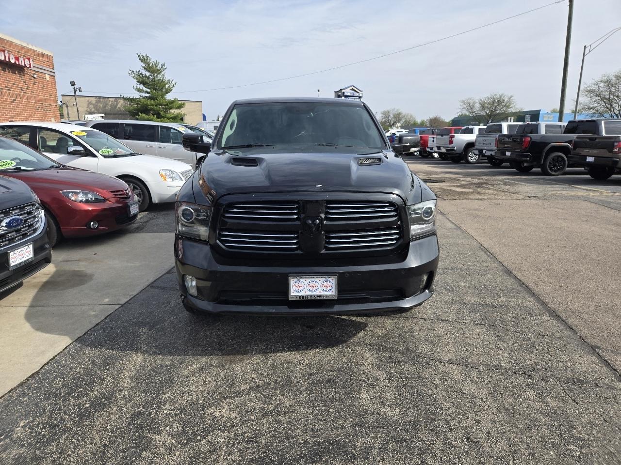 RAM 1500 4WD Crew Cab 140.5" Sport 2016