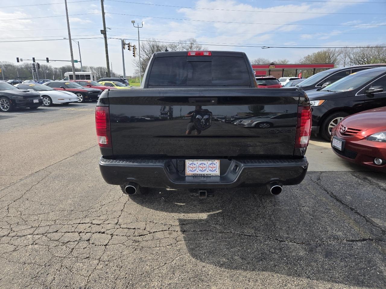 RAM 1500 4WD Crew Cab 140.5" Sport 2016