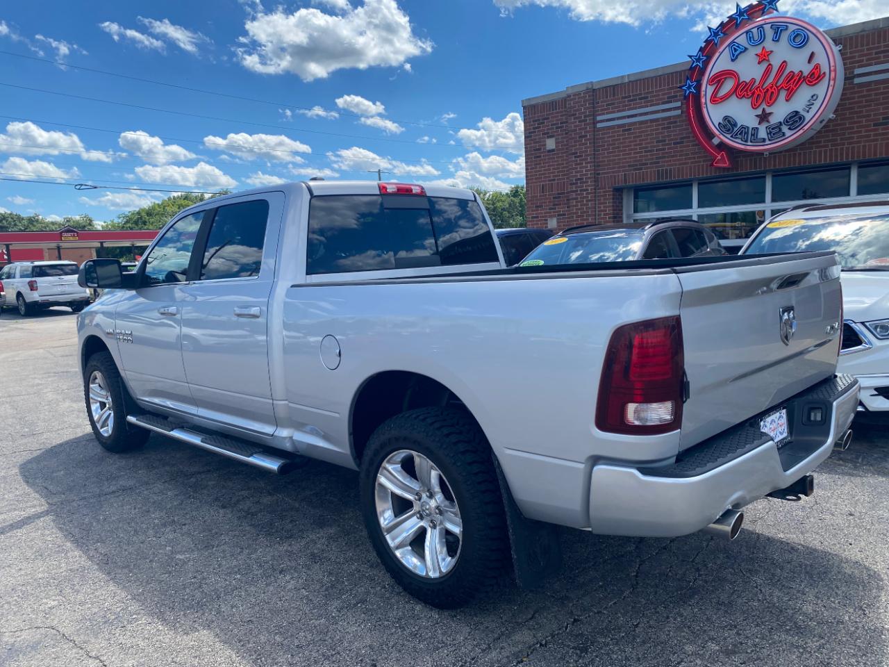 RAM 1500 4WD Crew Cab 149" Sport 2014