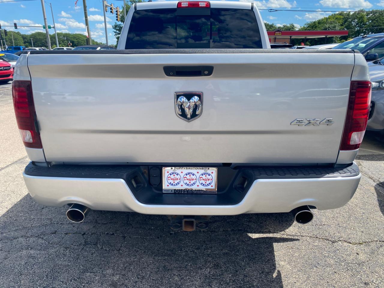 RAM 1500 4WD Crew Cab 149" Sport 2014