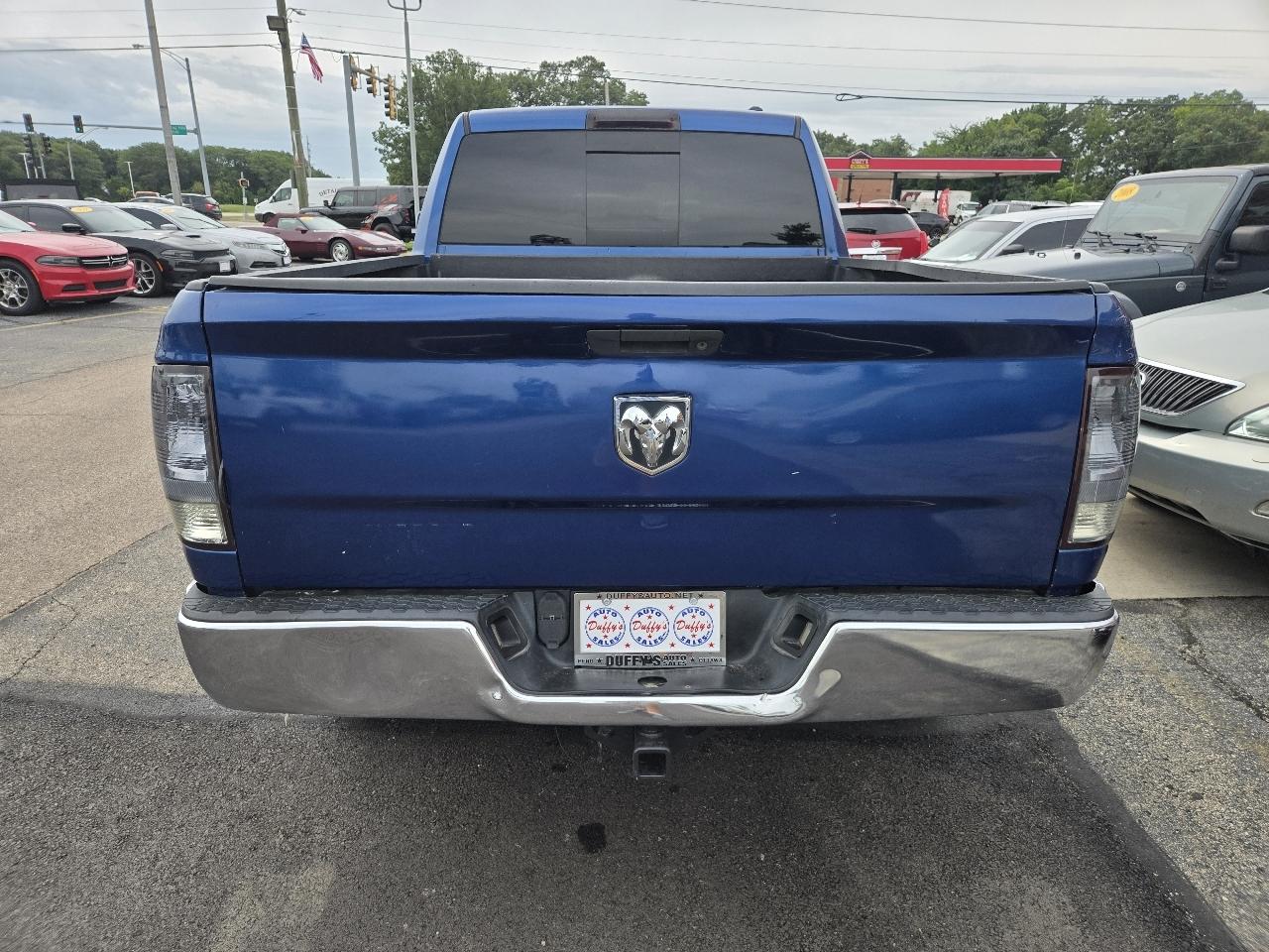 RAM 1500 4WD Quad Cab 140.5" SLT 2011