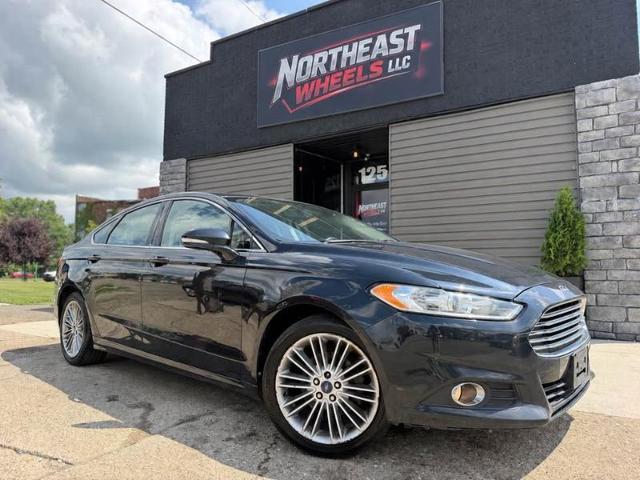 Dark Green 2014 Ford Fusion Sedan Front-Wheel Drive