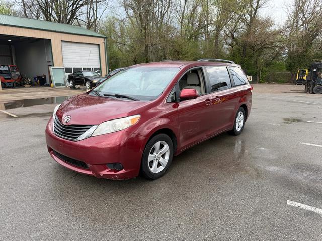 Red 2011 Toyota Sienna LE 8-Passenger V6 Minivan Front-Wheel Drive 6-Speed Automatic