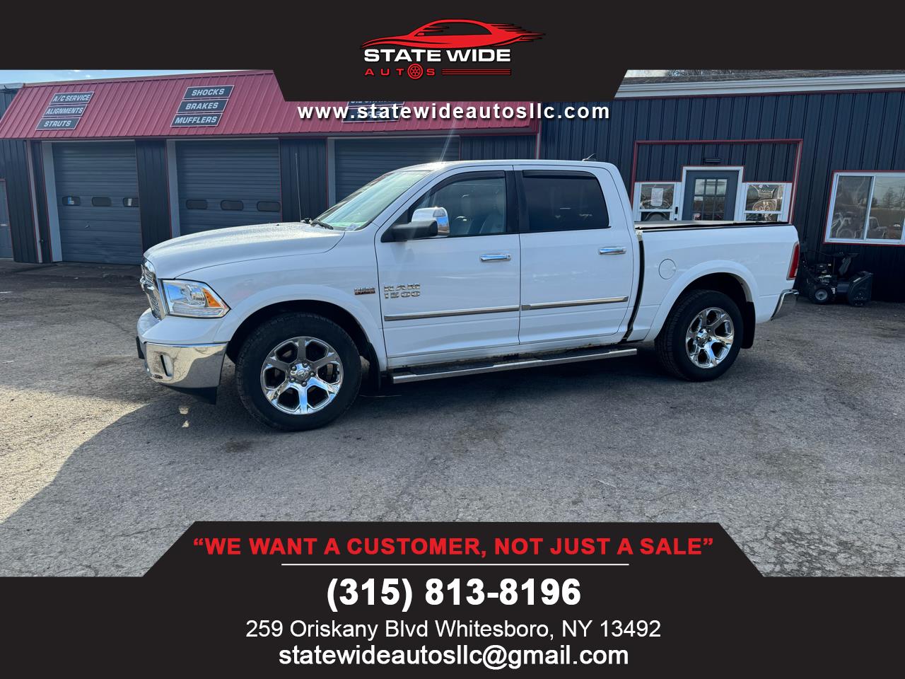 2014 RAM 1500 4WD Crew Cab 140.5" Laramie