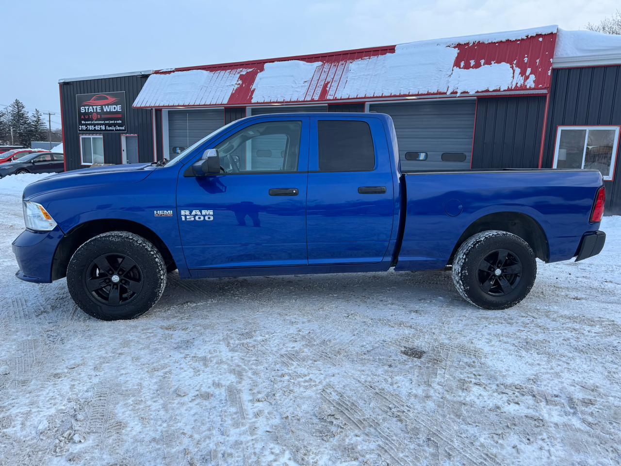 RAM 1500 4WD Quad Cab 140.5" Express 2016