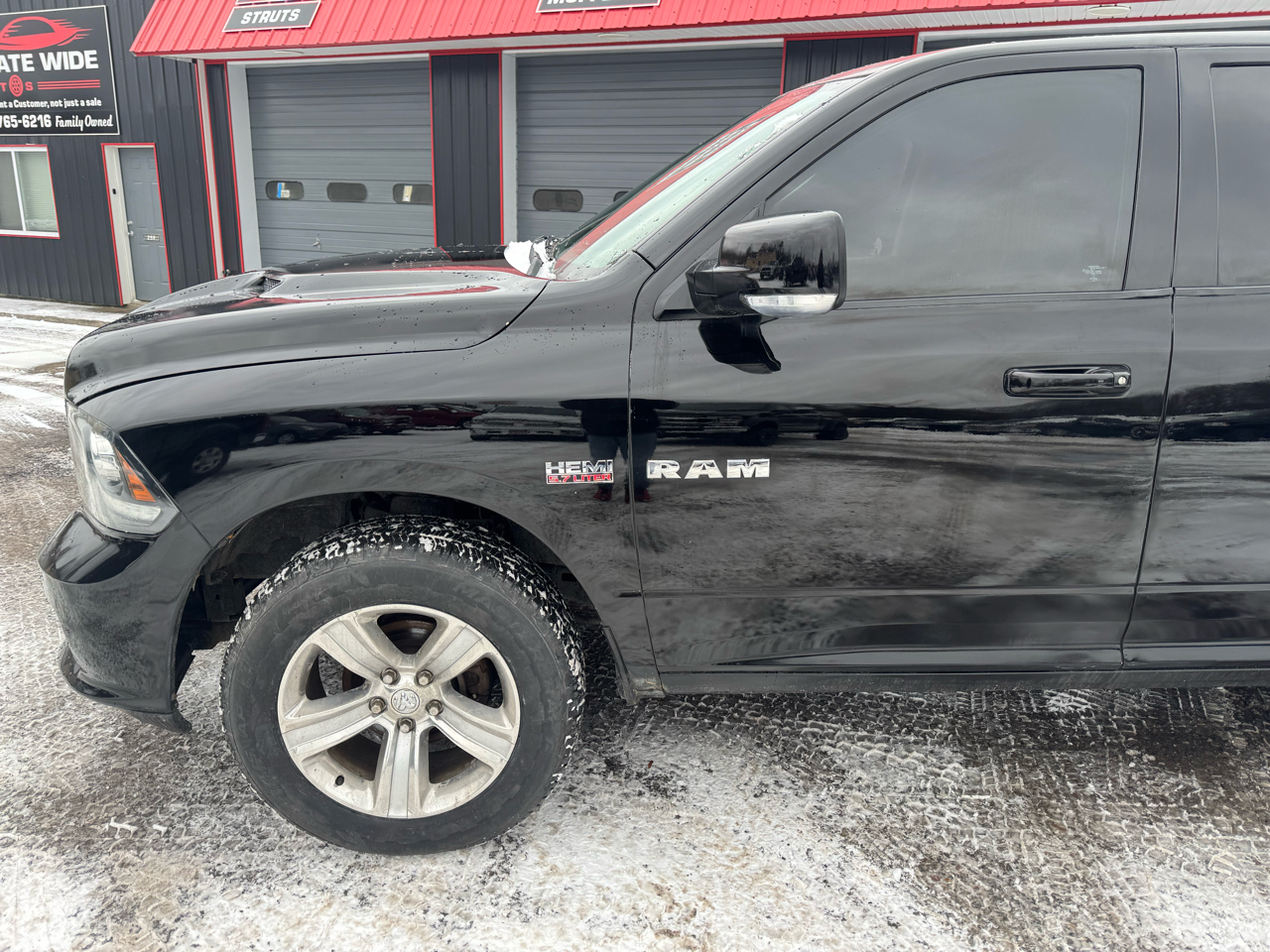 RAM 1500 4WD Crew Cab 149" Sport 2014