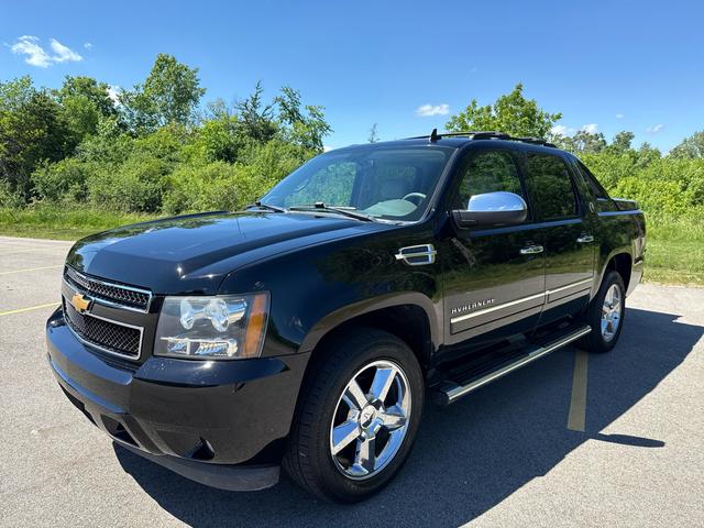 Black 2013 Chevrolet Avalanche Pickup Truck Four-Wheel Drive Automatic