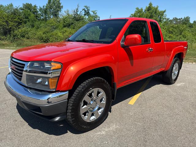 Orange 2012 GMC Canyon Pickup Truck Four-Wheel Drive Automatic