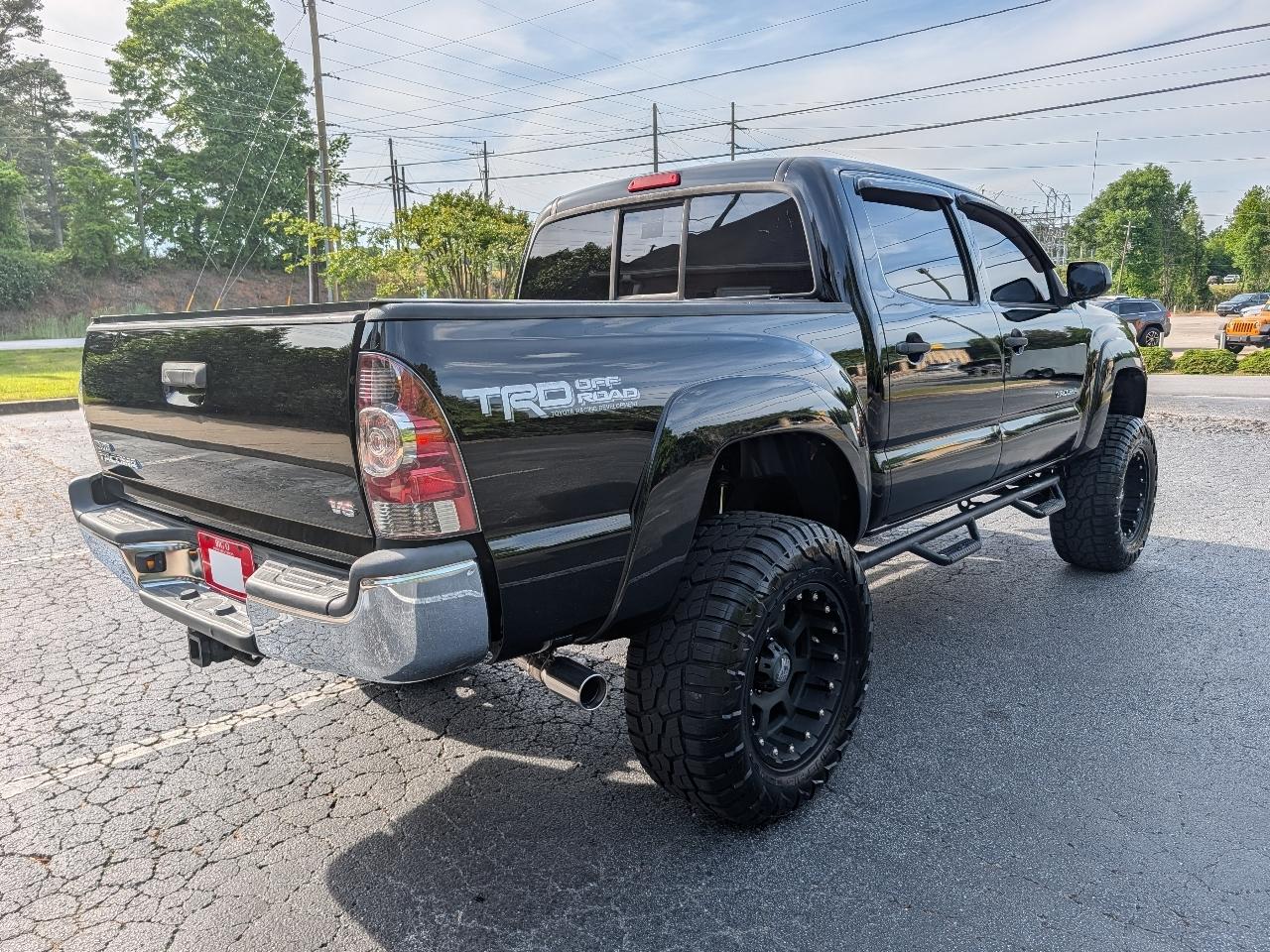 Toyota Tacoma 4WD Double Cab V6 MT (Natl) 2013
