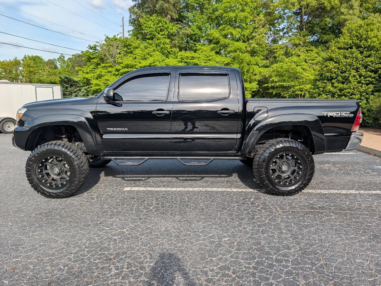 Toyota Tacoma 4WD Double Cab V6 MT (Natl) 2013