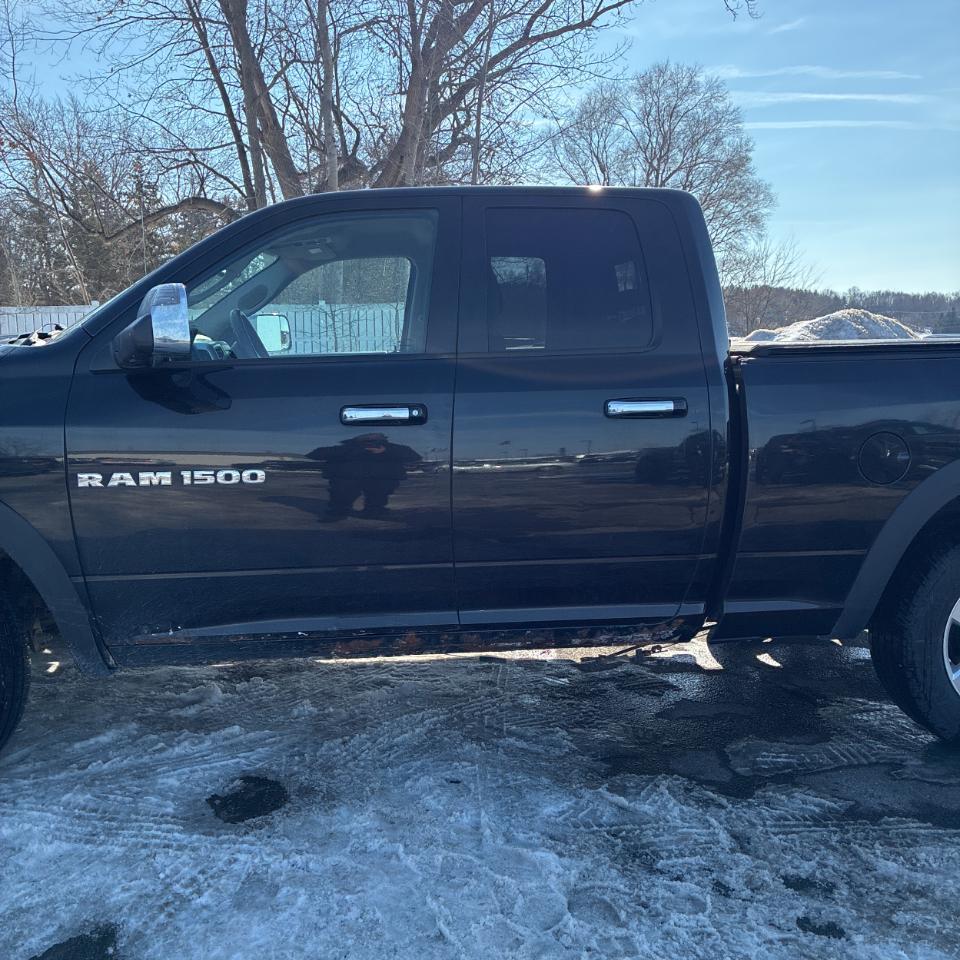 Dodge 1500 4WD Quad Cab 140.5" Big Horn 2011