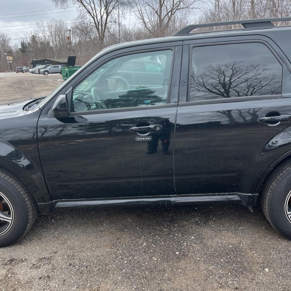 Ford Escape FWD 4dr V6 Auto XLT 2009