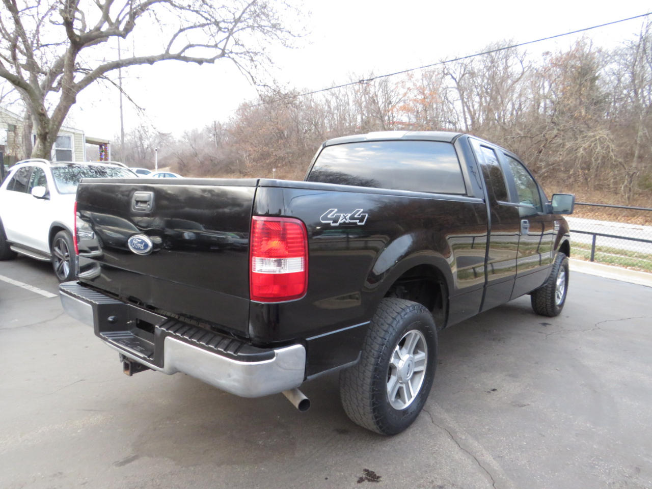 Ford F-150 Supercab 145" Lariat 4WD 2005