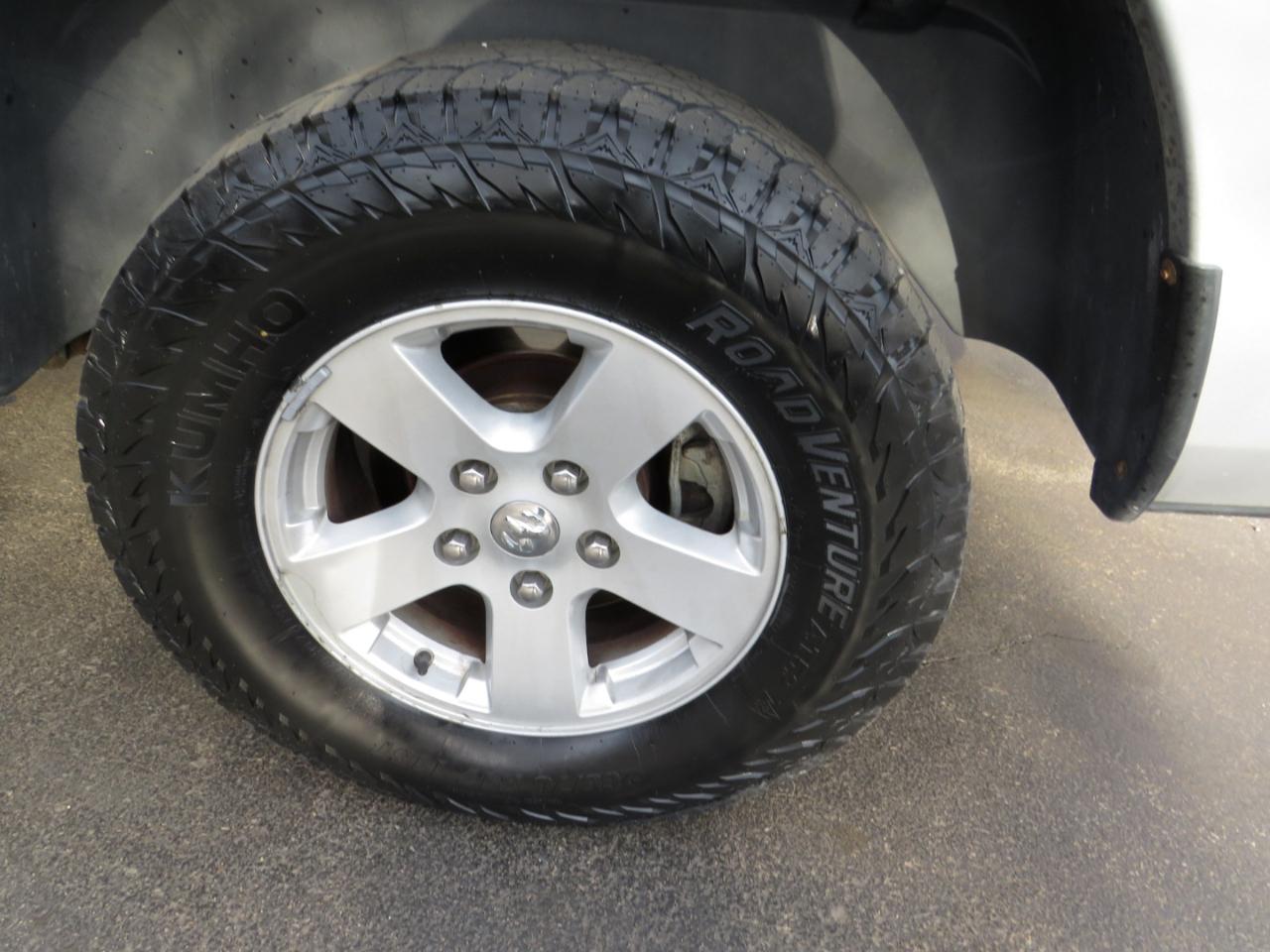 RAM 1500 4WD Quad Cab 140.5" SLT 2011