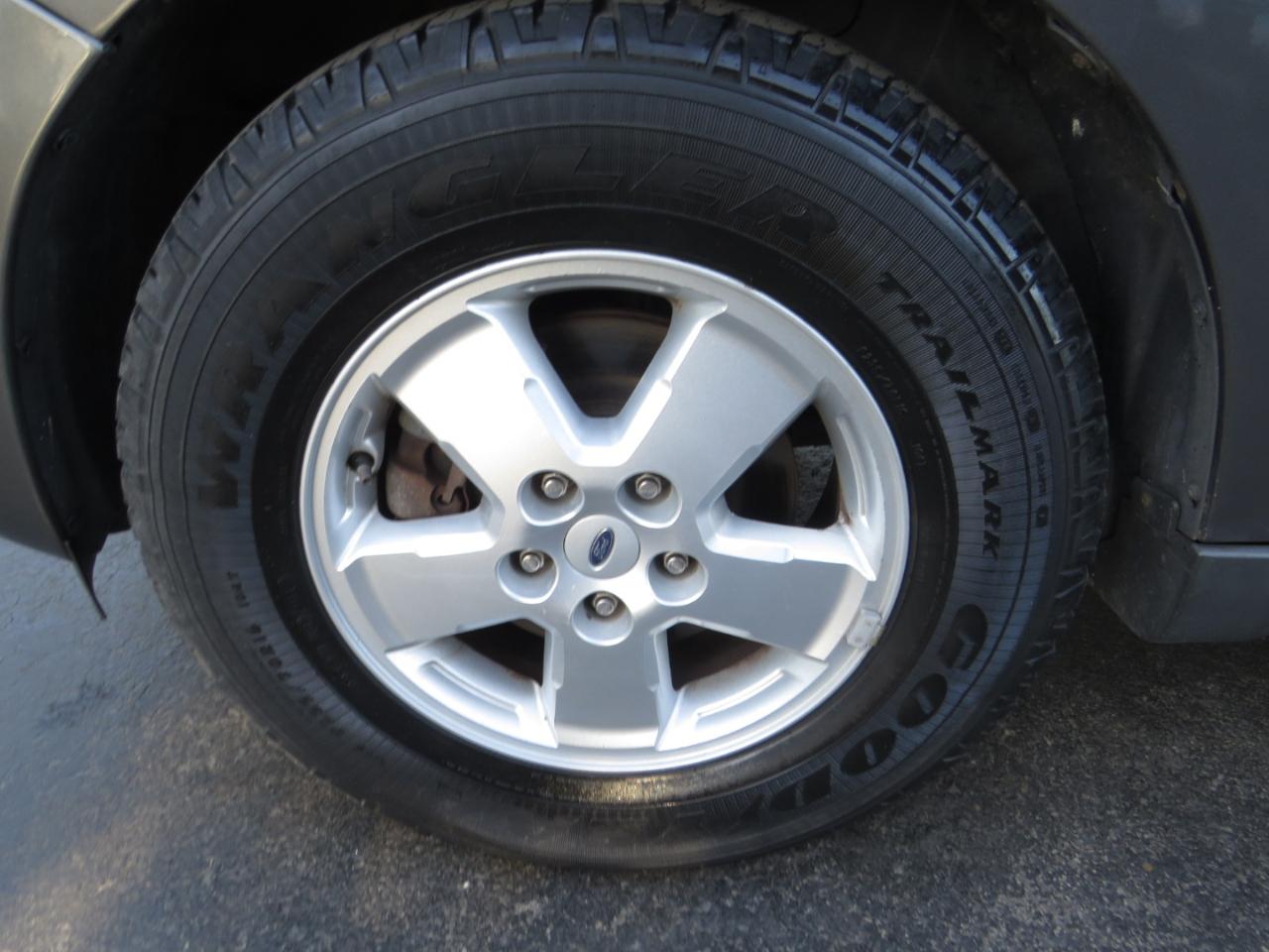 Ford Escape FWD 4dr V6 Auto Limited 2009