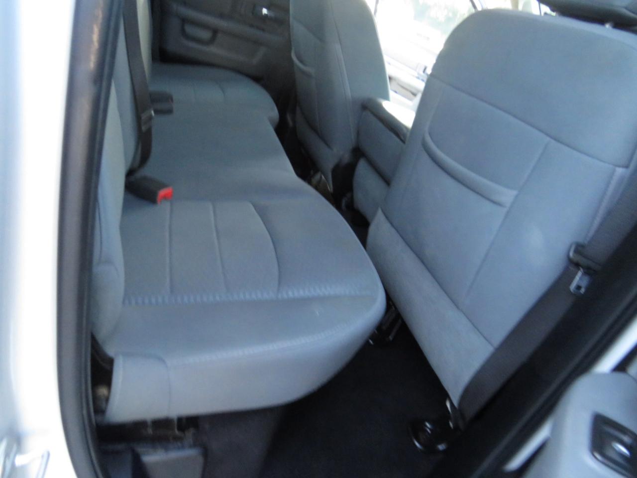 RAM 1500 4WD Quad Cab 140.5" SLT 2013