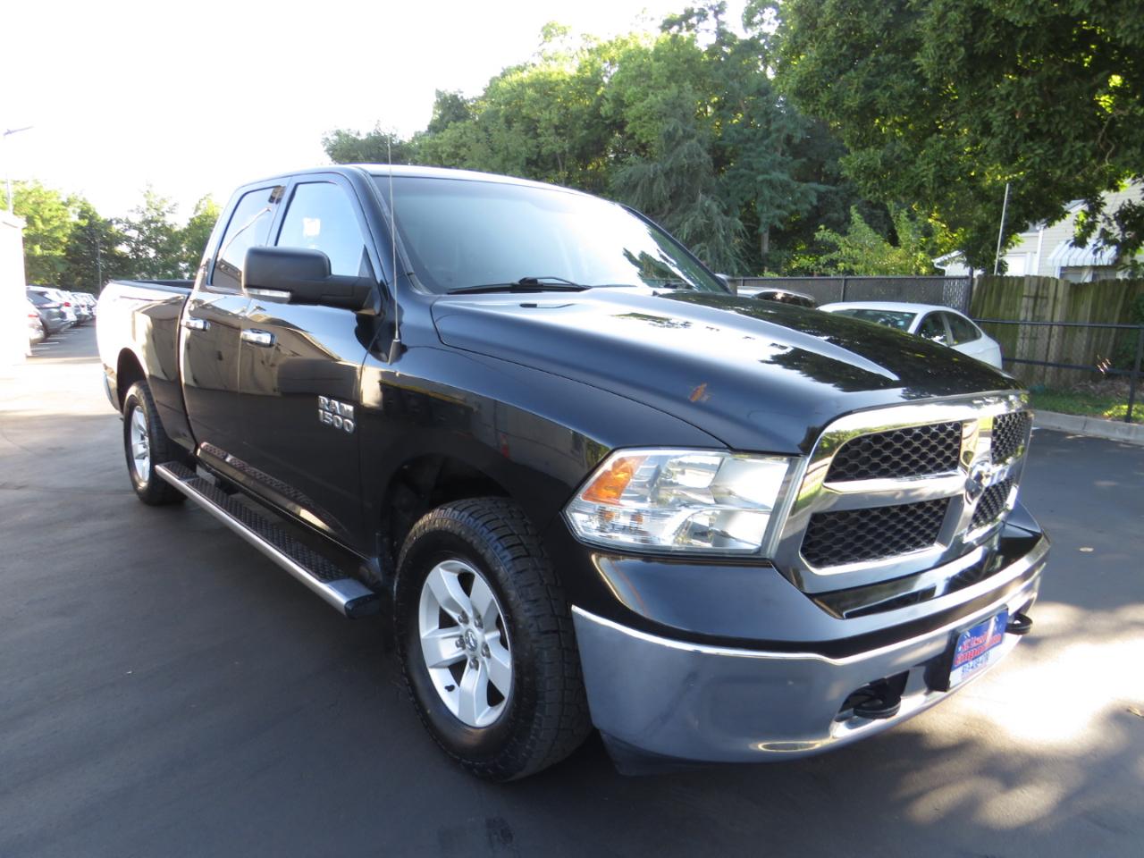 RAM 1500 4WD Quad Cab 140.5" SLT 2016