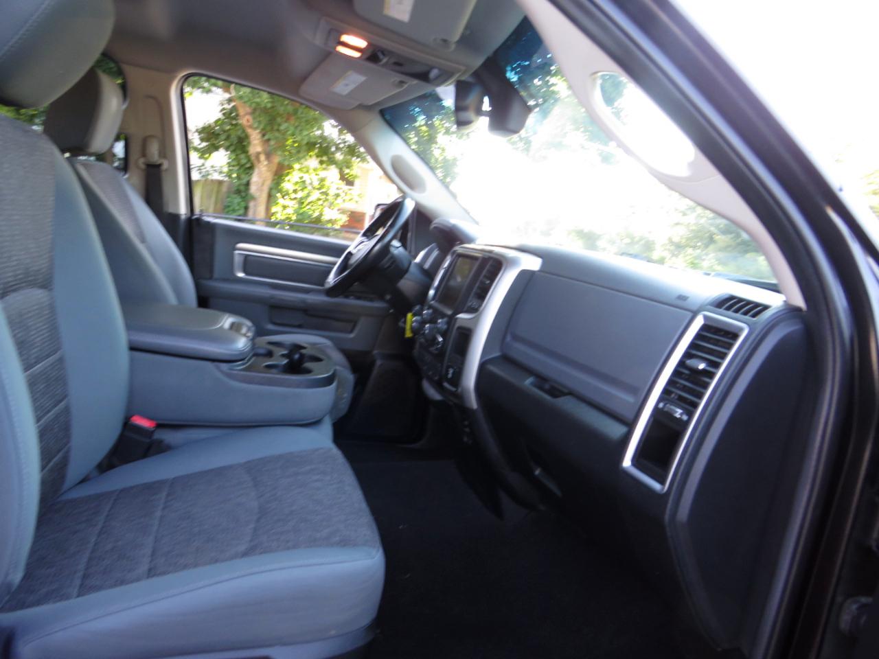 RAM 1500 4WD Quad Cab 140.5" SLT 2016