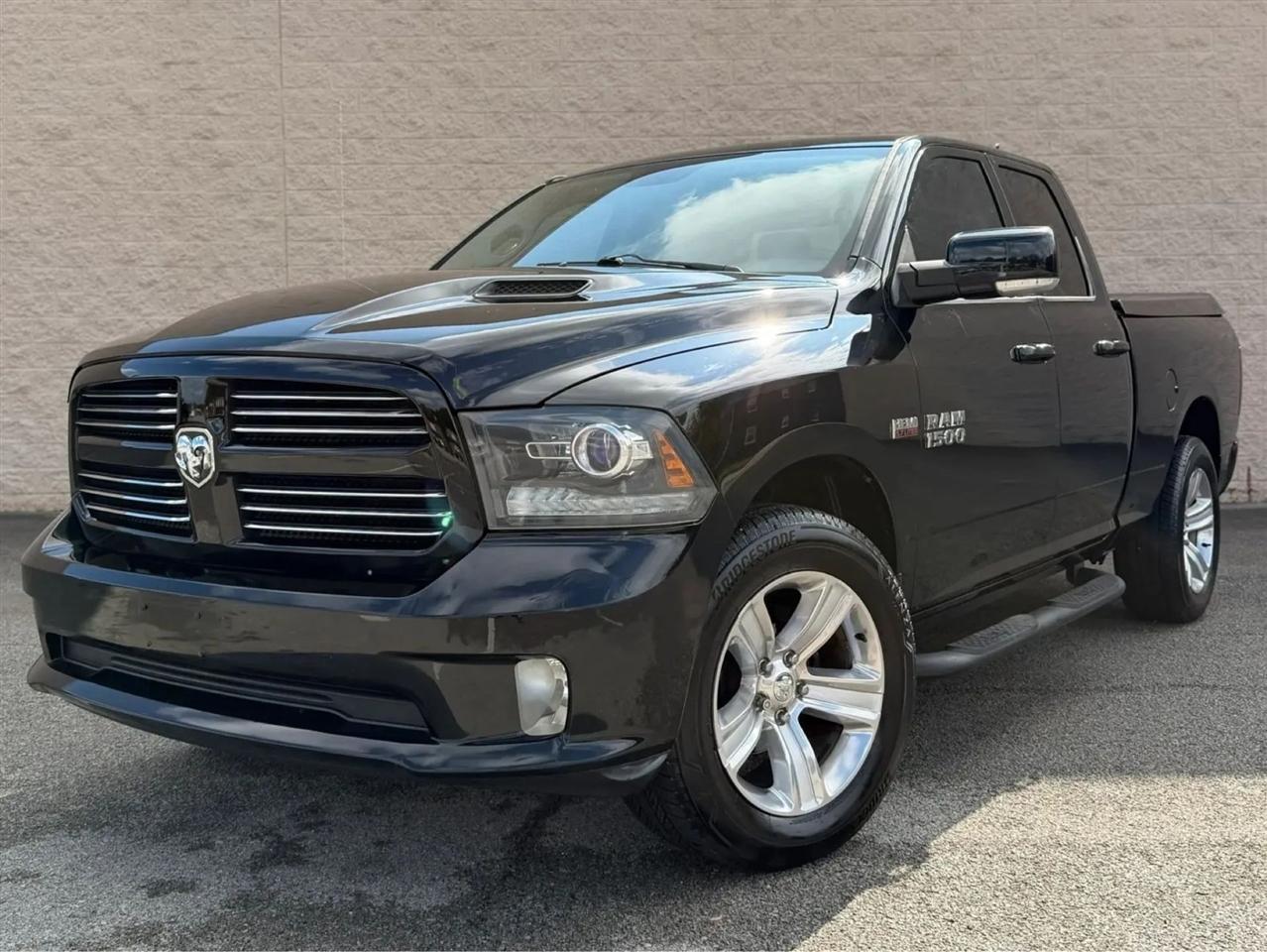 RAM 1500 4WD Quad Cab 140.5" Sport 2013