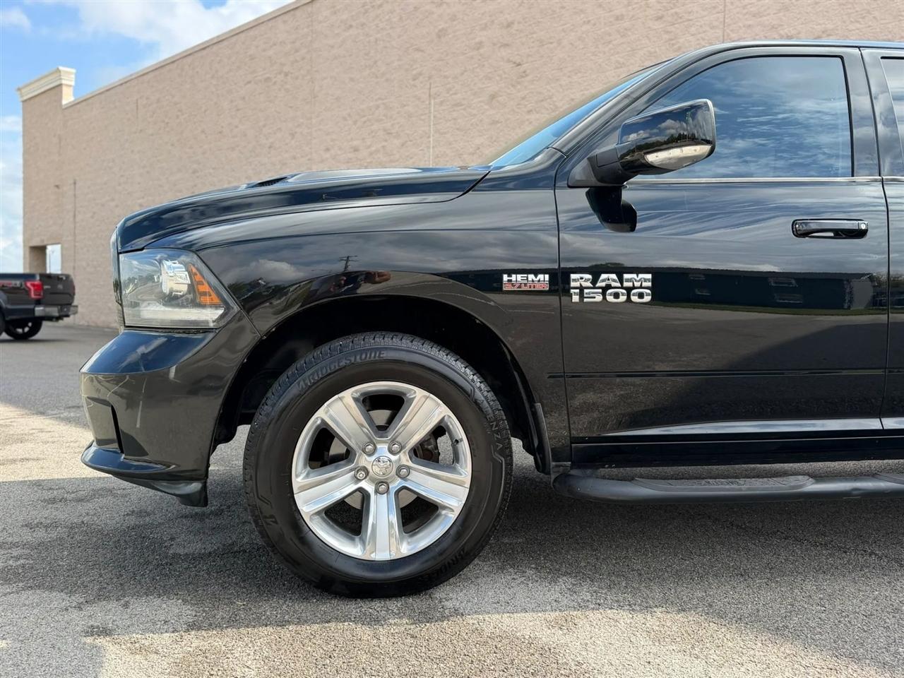 RAM 1500 4WD Quad Cab 140.5" Sport 2013