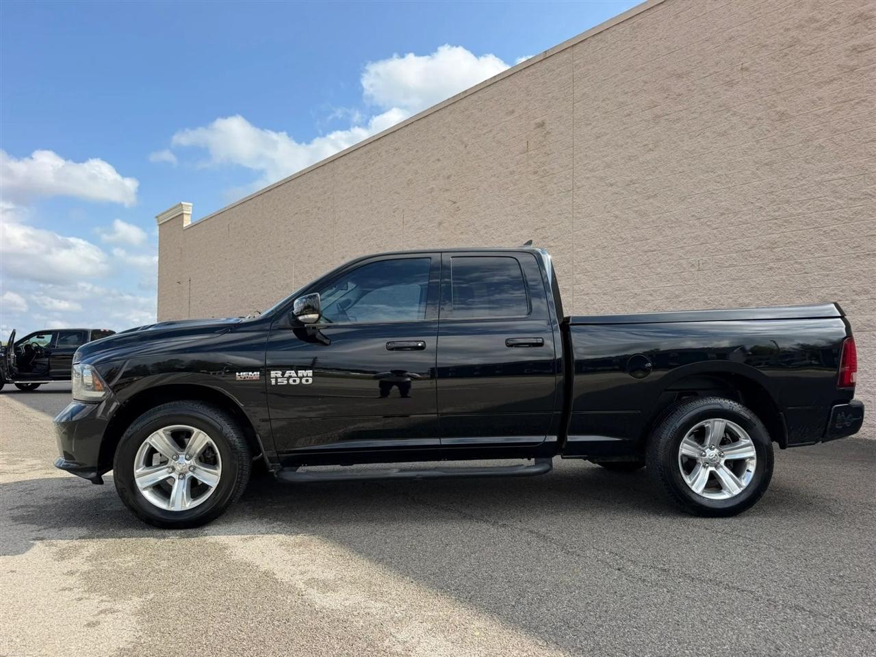 RAM 1500 4WD Quad Cab 140.5" Sport 2013