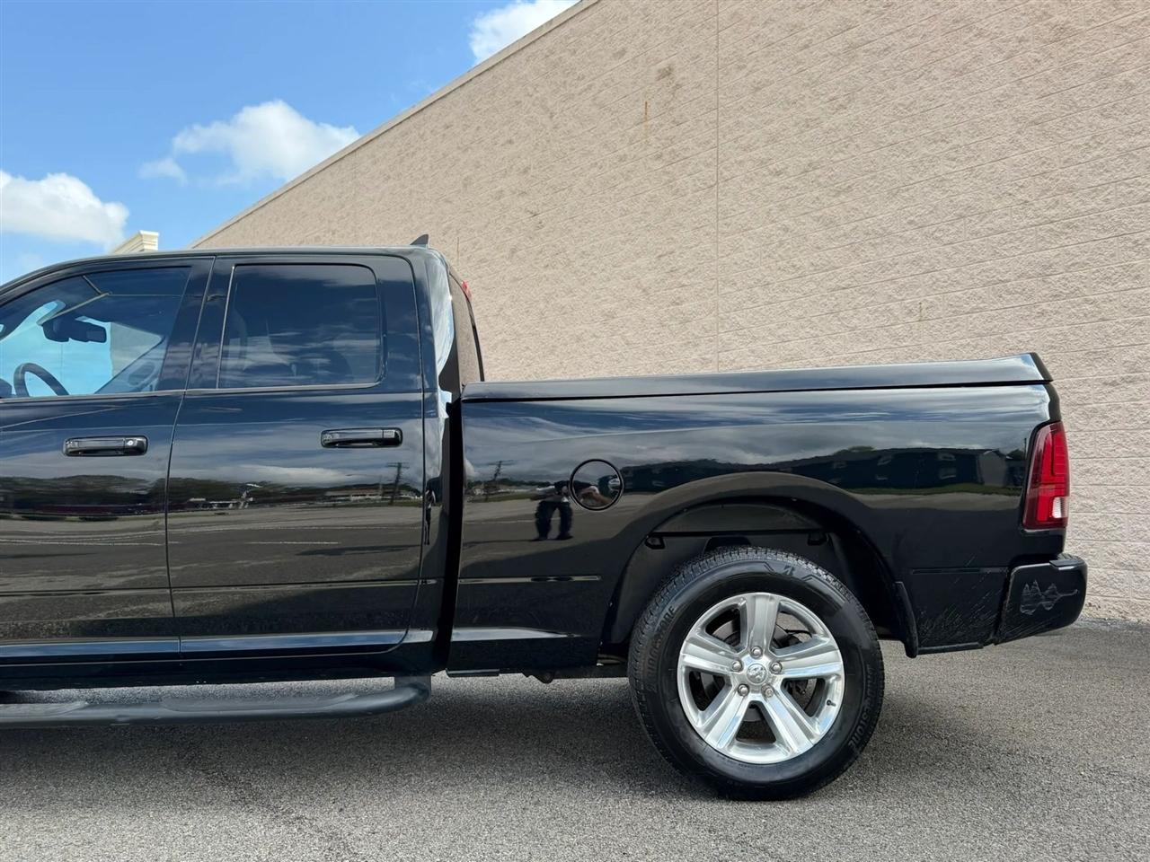 RAM 1500 4WD Quad Cab 140.5" Sport 2013