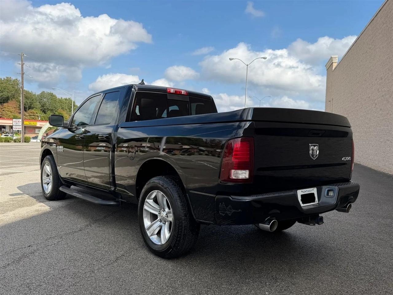 RAM 1500 4WD Quad Cab 140.5" Sport 2013