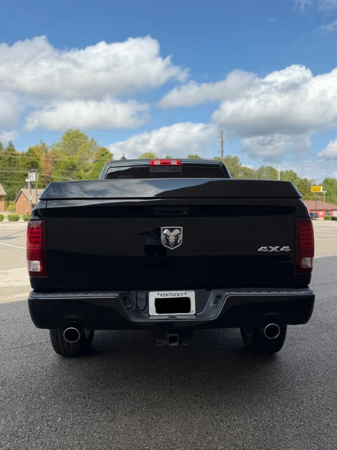 RAM 1500 4WD Quad Cab 140.5" Sport 2013
