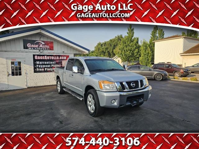 Silver 2009 Nissan Titan Pickup Truck Four-Wheel Drive Automatic