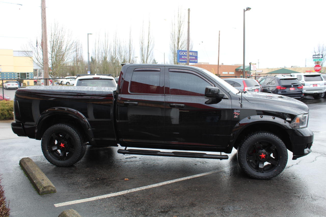 RAM 1500 4WD Quad Cab 140.5" Sport 2012