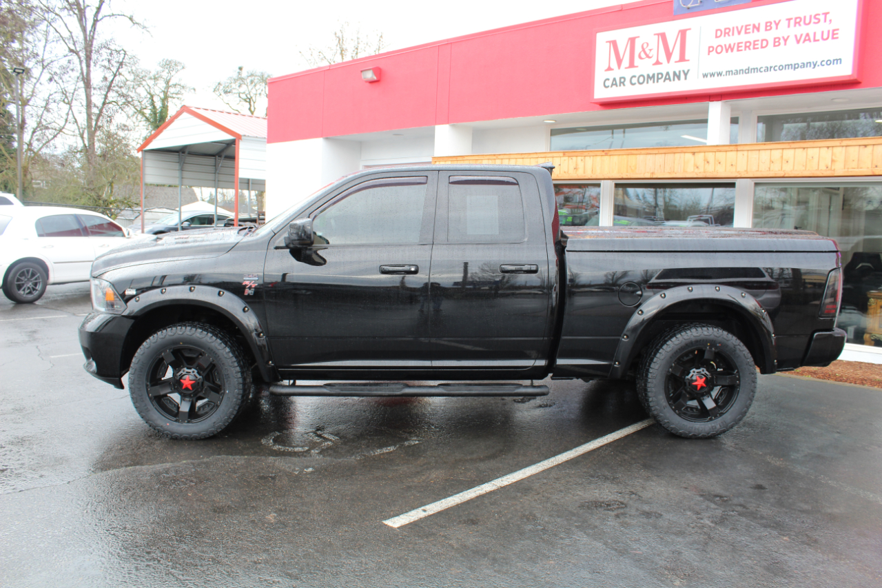 RAM 1500 4WD Quad Cab 140.5" Sport 2012