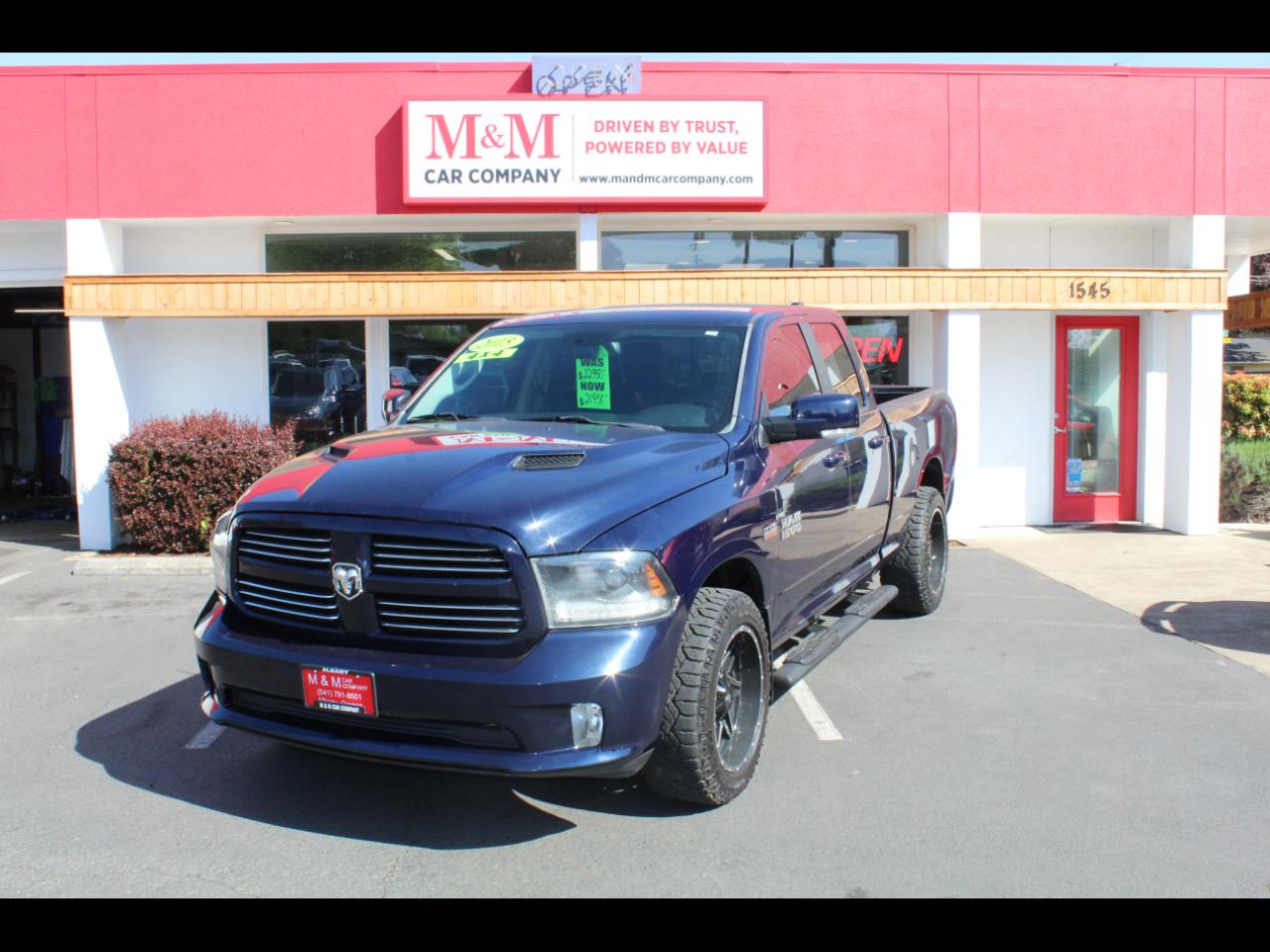 RAM 1500 4WD Quad Cab 140.5" Sport 2015