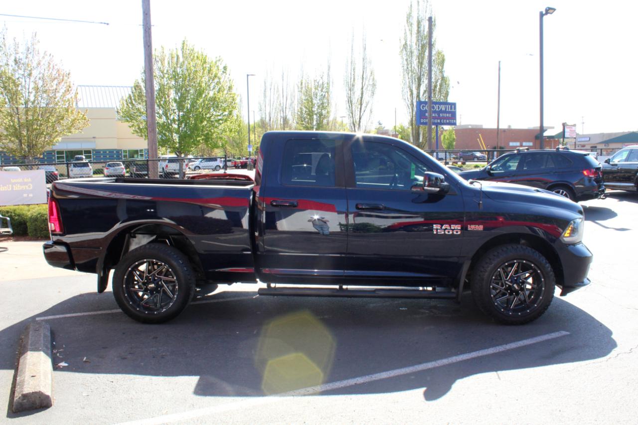 RAM 1500 4WD Quad Cab 140.5" Sport 2015