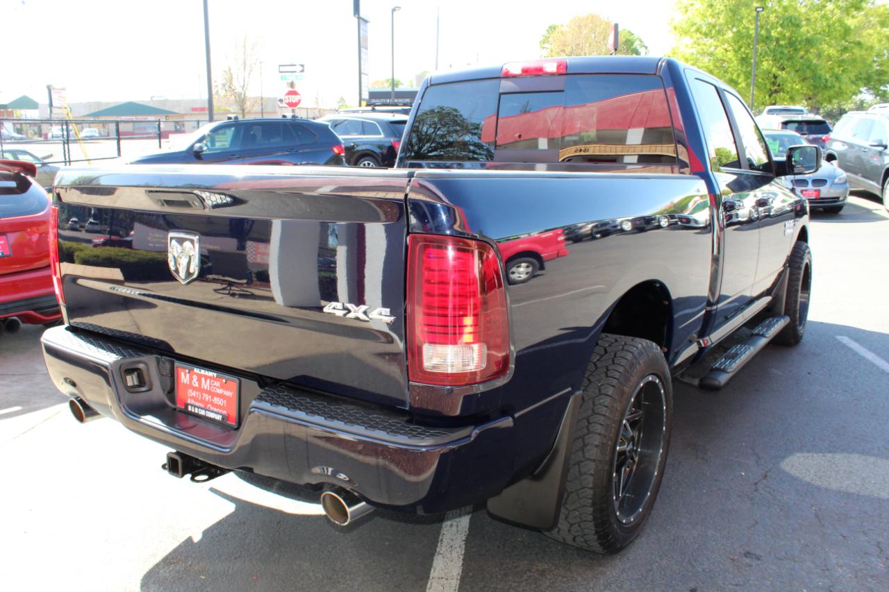 RAM 1500 4WD Quad Cab 140.5" Sport 2015