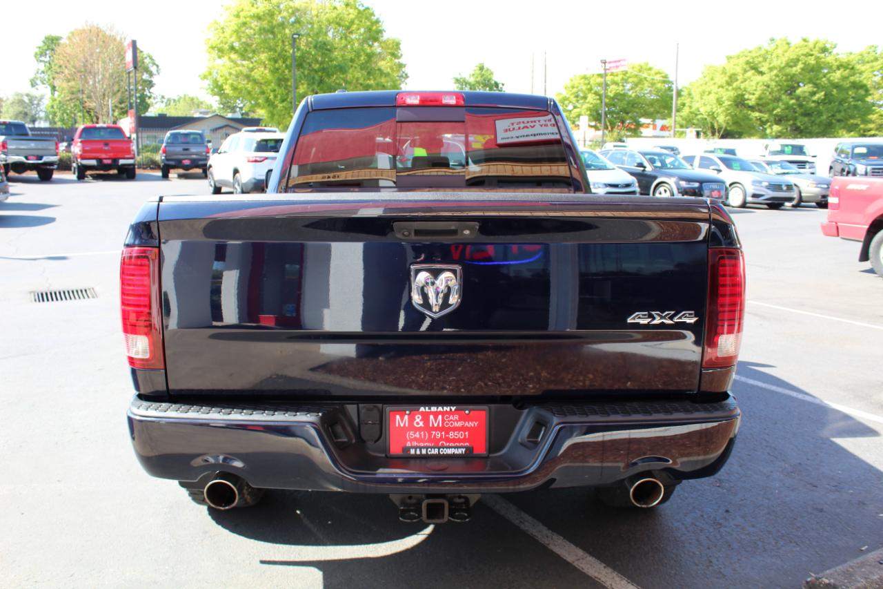 RAM 1500 4WD Quad Cab 140.5" Sport 2015