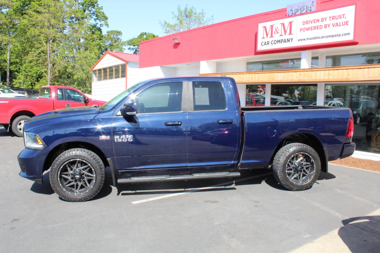 RAM 1500 4WD Quad Cab 140.5" Sport 2015