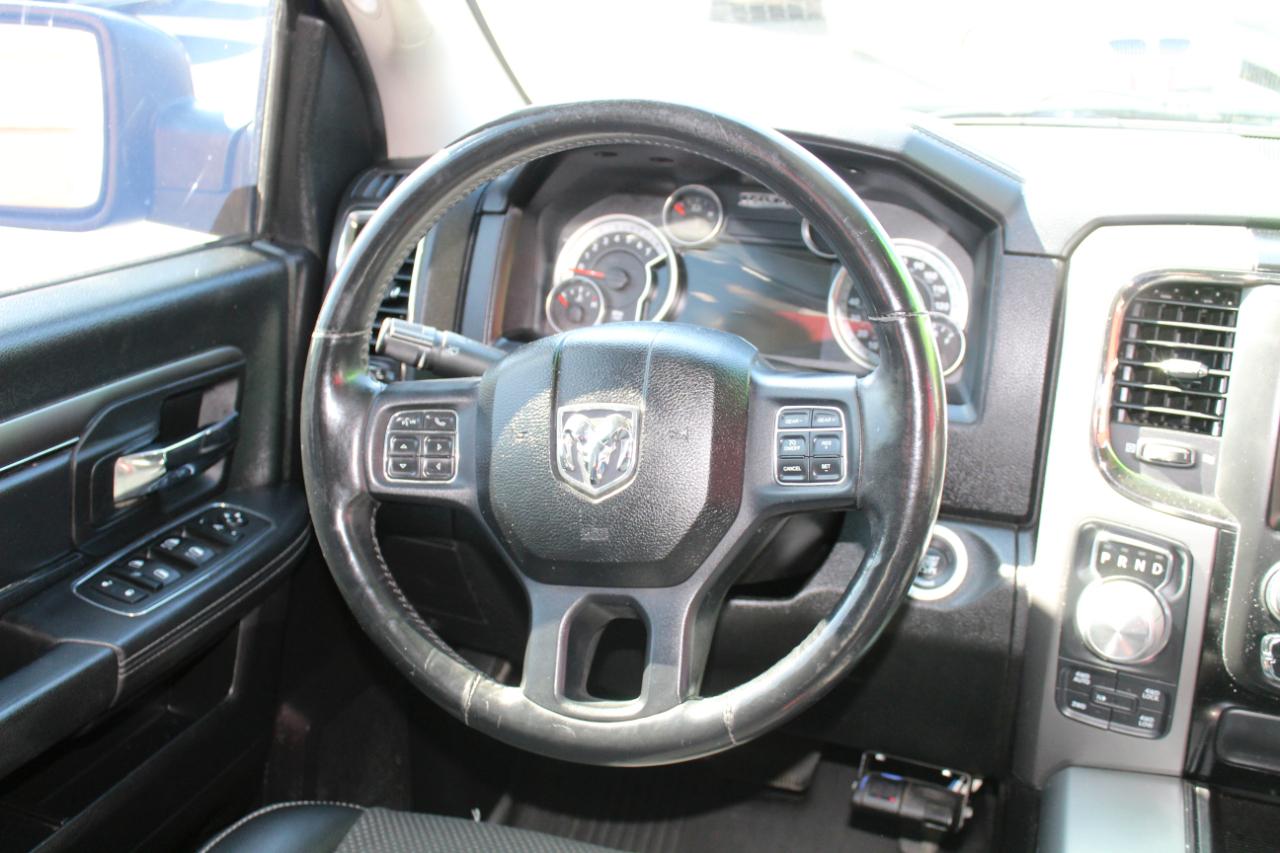 RAM 1500 4WD Quad Cab 140.5" Sport 2015