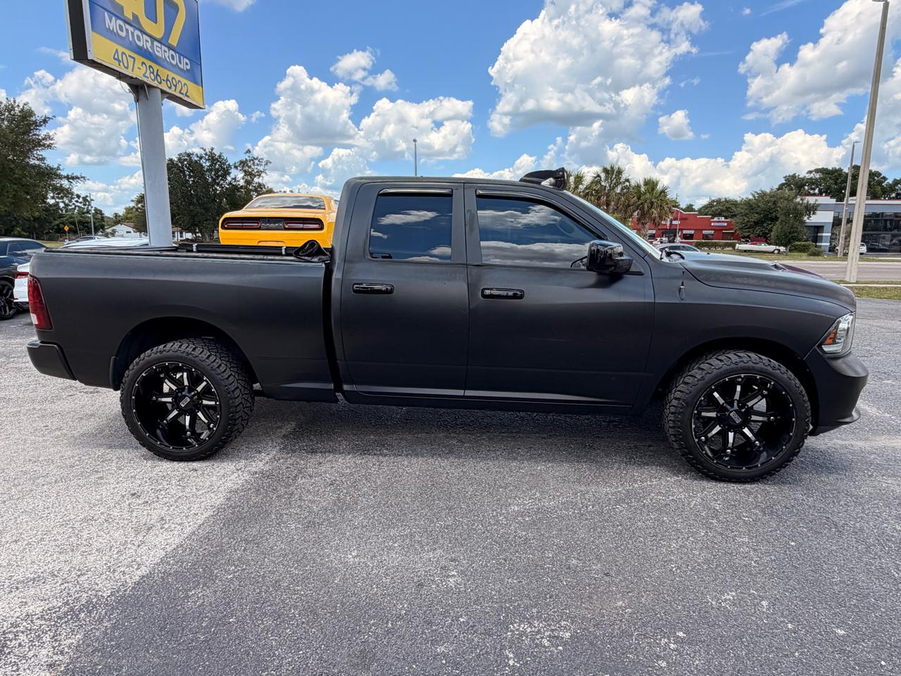 RAM 1500 2WD Quad Cab 140.5" Sport 2017
